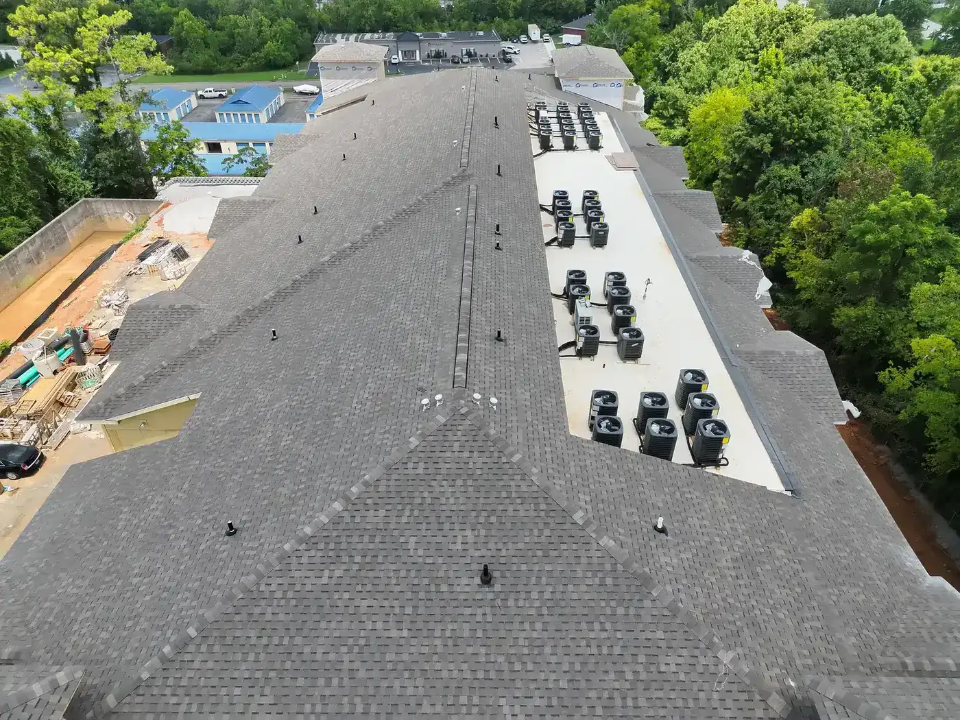 Echelon from above: shingle roof with a TPO section holding the rooftop units